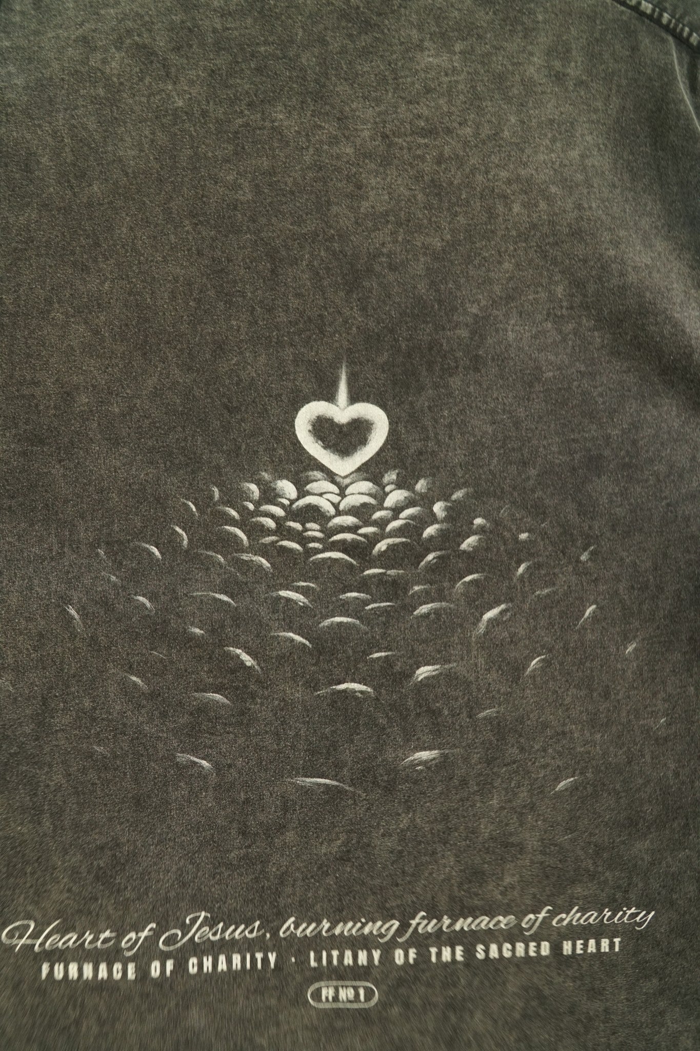 Furnace of Charity engraving detail, burning heart over coals