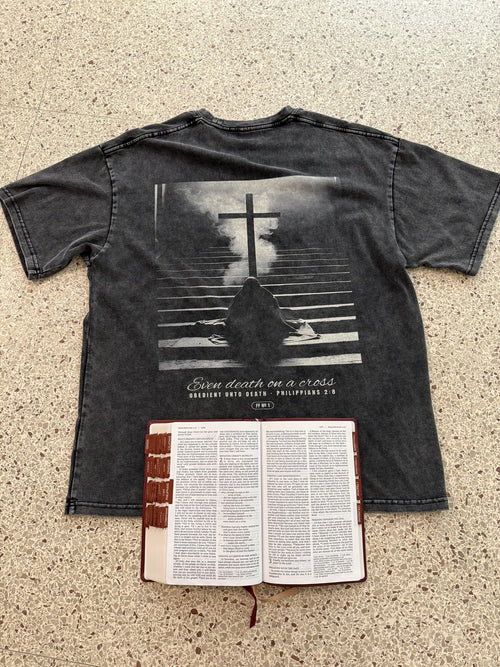 Obedient Unto Death engraved back print with Bible, flat lay
