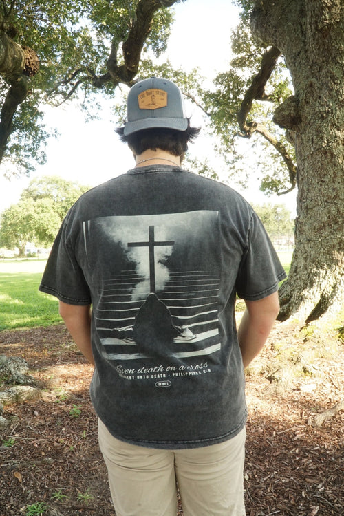 Obedient Unto Death back print worn, washed black tee