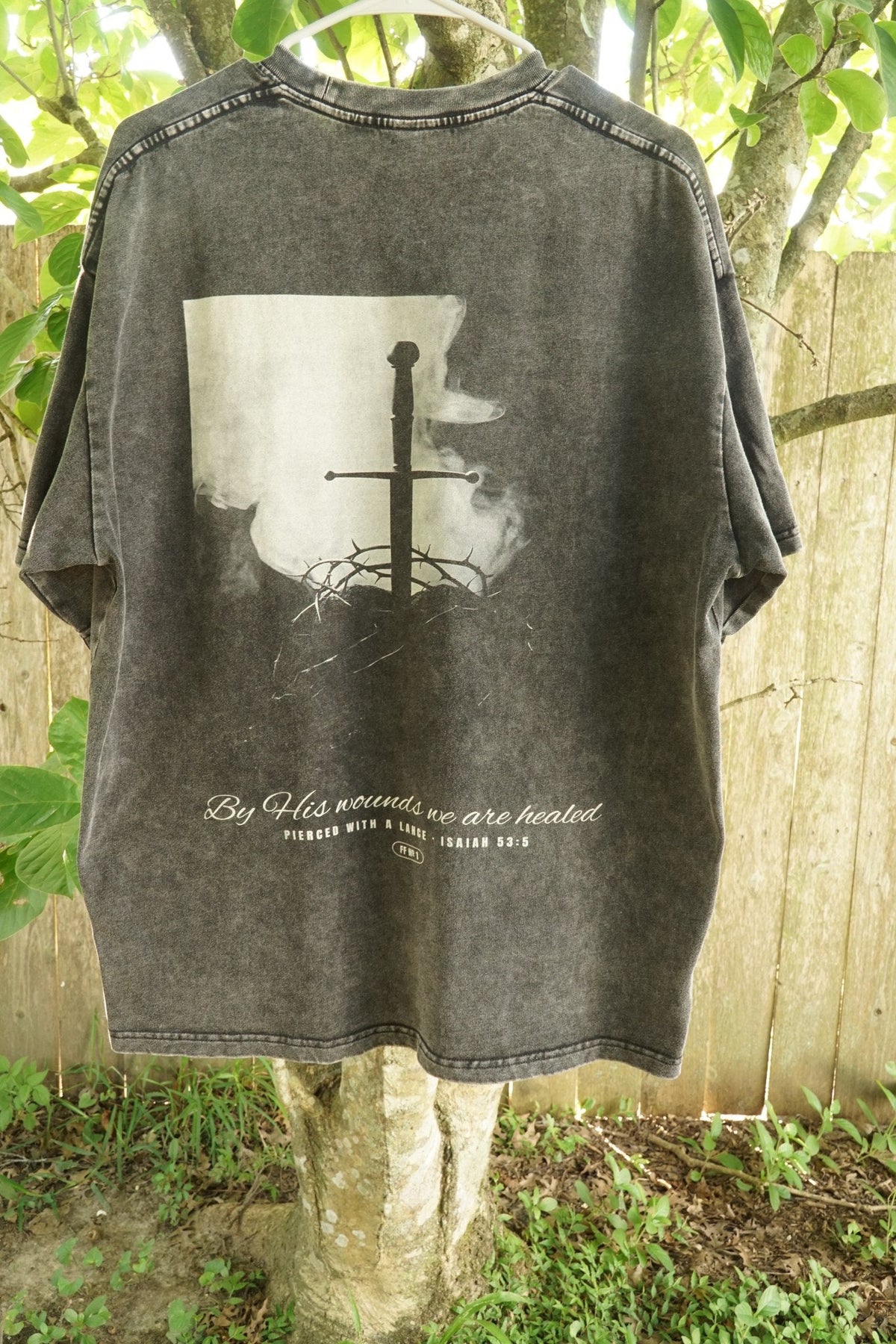 Pierced with a Lance washed black heavyweight tee