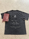 The Anchor engraved back print, washed black heavyweight tee, flat lay