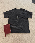 Furnace of Charity engraved back print, washed black tee, flat lay