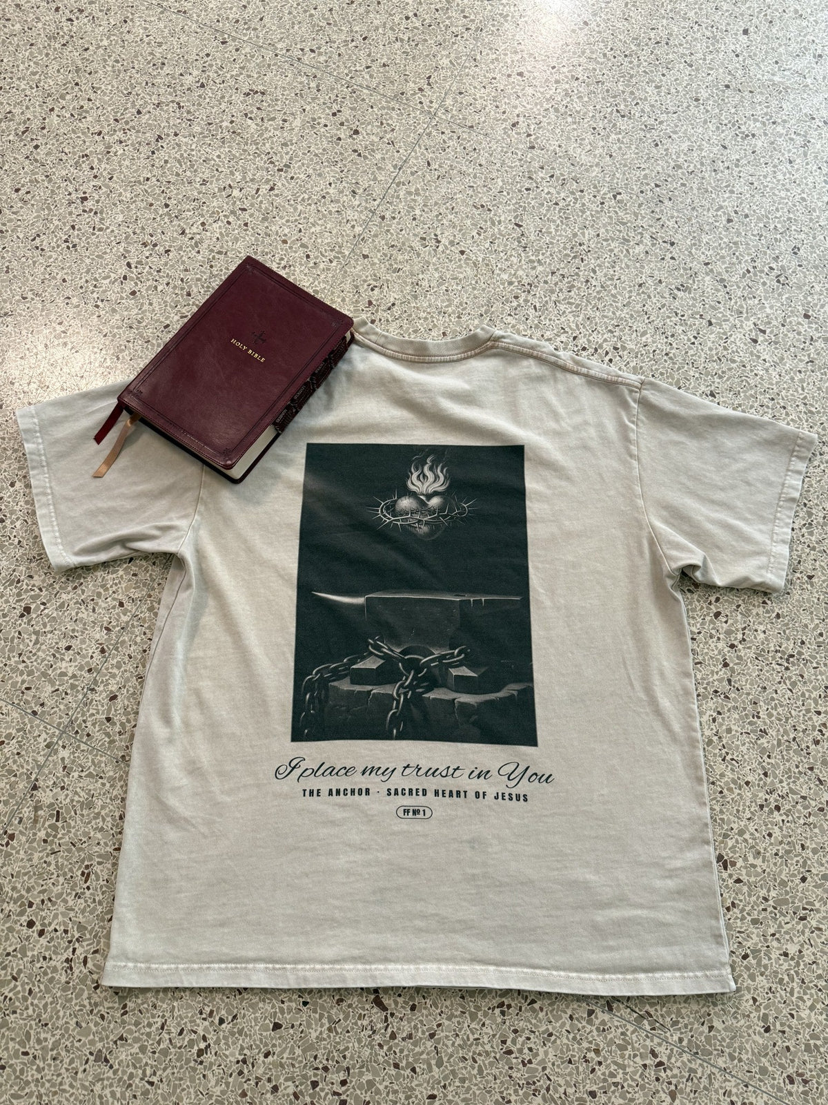 The Anchor back print, stone heavyweight tee, flat lay